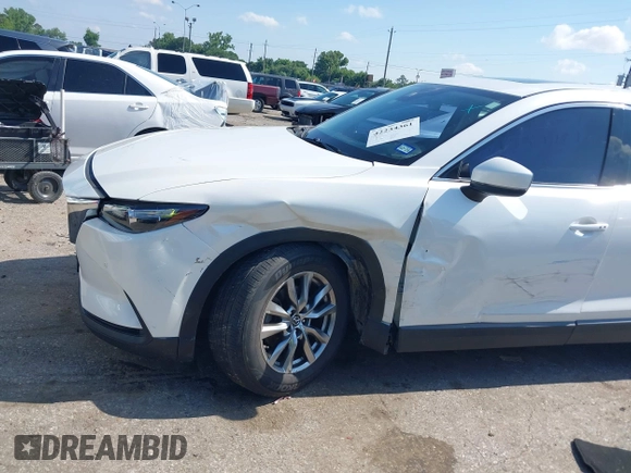 2019 Mazda CX-9 Touring with VIN JM3TCACY7K0314539, listed as a IAAI auction lot 42234361 with 98,299 mi miles and . Bid and sale history available at DreamBid. Image 6.