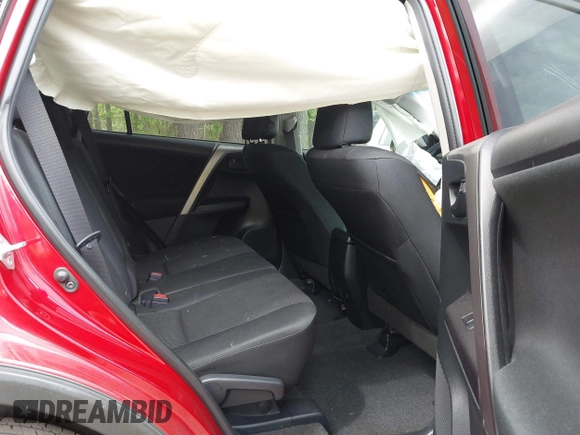 2016 Toyota RAV4 LE with VIN JTMZFREV4GJ062701, listed as a IAAI auction lot 42084694 with 121,553 mi miles and . Bid and sale history available at DreamBid. Image 8.