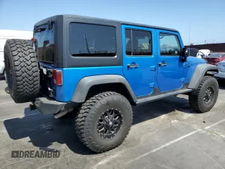 2015 Jeep Wrangler Unlimited Rubicon с VIN 1C4BJWFG9FL591529, выставлен на аукционе Copart как лот 58721265 с пробегом 110 373 миль миль и Чистый • Clean title. История ставок и продаж доступна на DreamBid. Изображение 3.
