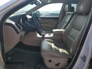 2014 Jeep Grand Cherokee Limited with VIN 1C4RJFBG4EC299273, listed as a Copart auction lot 59660695 with 162,528 mi miles and Salvage title. Bid and sale history available at DreamBid. Image 7.