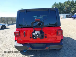 2023 Jeep Wrangler Sahara z VIN 1C4JJXP63PW568190, wystawiony jako IAAI lot #42133650 z przebiegiem 32 347 mil mil oraz . Historia ofert i sprzedaży dostępna na DreamBid. Obrazek 16.