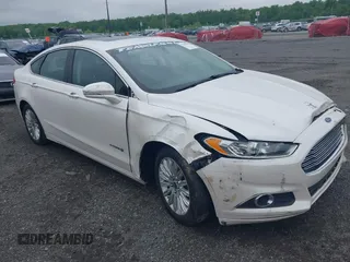 2014 Ford Fusion SE Hybrid with VIN 3FA6P0LUXER125766, listed as a IAAI auction lot 42178177 with 284,385 mi miles and . Bid and sale history available at DreamBid. Image 1.