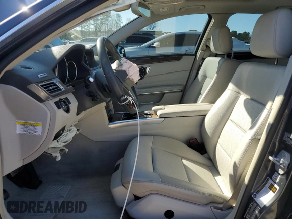 2014 Mercedes-Benz E 350 Sport with VIN WDDHF5KB6EA969855, listed as a Copart auction lot 49295495 with 63,898 mi miles and Salvage Title. Bid and sale history available at DreamBid. Image 7.