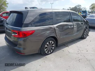 2022 Honda Odyssey EX-L with VIN 5FNRL6H77NB031502, listed as a IAAI auction lot 41706098 with 57,074 mi miles and . Bid and sale history available at DreamBid. Image 4.