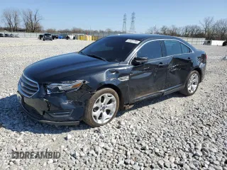 2014 Ford Taurus SEL with VIN 1FAHP2E85EG119210, listed as a Copart auction lot 51581795 with 165,128 mi miles and Salvage Title. Bid and sale history available at DreamBid. Image 1.