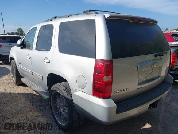 2011 Chevrolet Tahoe LS with VIN 1GNSCAE00BR140716, listed as a IAAI auction lot 40225018 with 189,052 mi miles and . Bid and sale history available at DreamBid. Image 3.