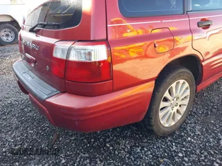 2002 Subaru Forester S w/Premium Pkg with VIN JF1SF656X2H757330, listed as a IAAI auction lot 41758034 with 228,297 mi miles. Bid and sale history available at carsss.com. Image 18.