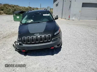 2016 Jeep Cherokee Trailhawk с VIN 1C4PJMBS8GW352316, выставлен на аукционе Copart как лот 62519365 с пробегом 128 576 миль миль и Списание • Salvage title. История ставок и продаж доступна на DreamBid. Изображение 14.