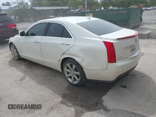 2014 Cadillac ATS Luxury RWD z VIN 1G6AB5RX6E0130600, wystawiony jako IAAI lot #42094510 z przebiegiem 122 872 mil mil oraz . Historia ofert i sprzedaży dostępna na DreamBid. Obrazek 3.