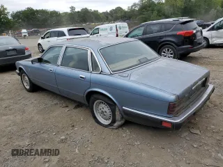 1989 Jaguar XJ with VIN SAJHY1540KC578115, listed as a Copart auction lot 69142274 with Not Provided miles and Clean Title. Bid and sale history available at DreamBid. Image 2.