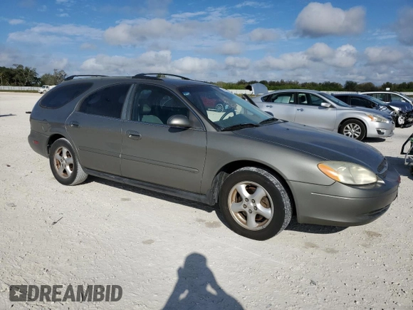 2003 Ford Taurus SE Standard with VIN 1FAFP58U33A259080, listed as a Copart auction lot 86819024 with 143,482 mi miles and Salvage Title. Bid and sale history available at carsss.com. Image 4.