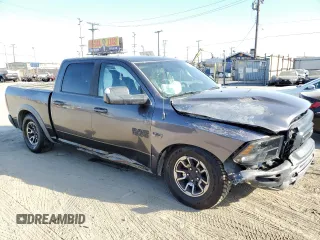 2016 Ram 1500 Rebel z VIN 1C6RR7YT6GS211830, wystawiony jako Copart lot #71652014 z przebiegiem 56 512 mil mil oraz Szkoda całkowita • Salvage title. Historia ofert i sprzedaży dostępna na DreamBid. Obrazek 4.
