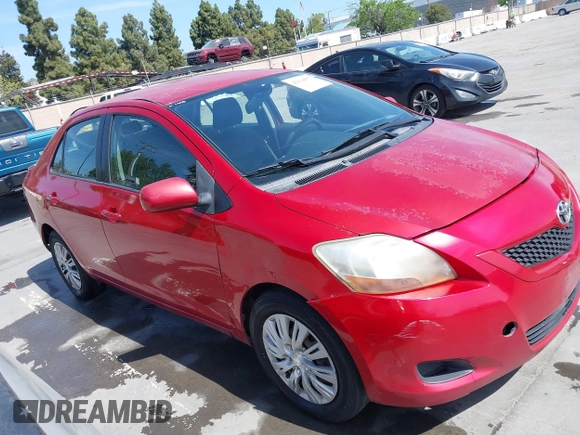 2009 Toyota Yaris with VIN JTDBT903591342243, listed as a IAAI auction lot 42104557 with 407,106 mi miles. Bid and sale history available at carsss.com. Image 1.