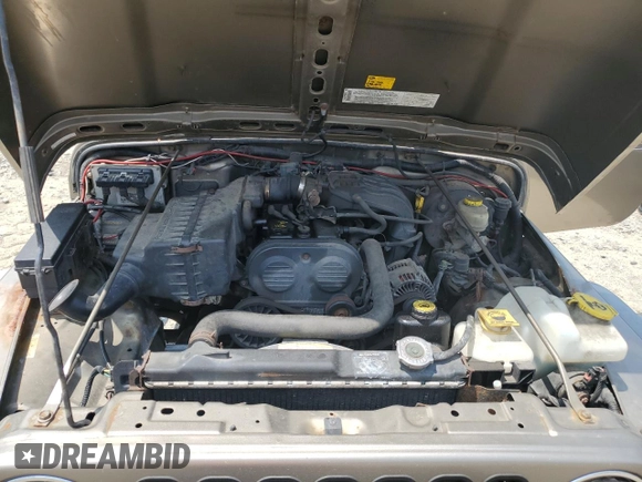 2004 Jeep Wrangler SE with VIN 1J4FA29164P797604, listed as a Copart auction lot 59978155 with 166,888 mi miles and Clean title. Bid and sale history available at DreamBid. Image 11.