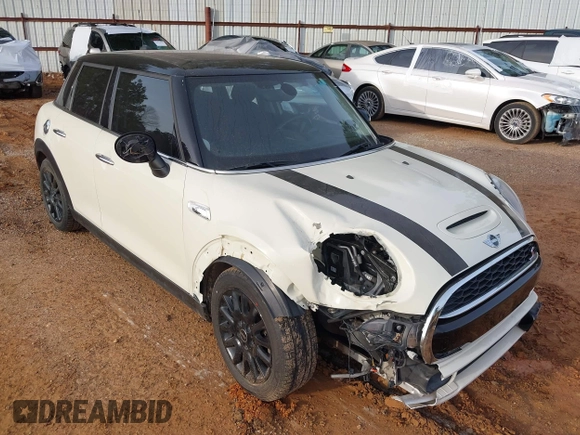 2015 MINI Hardtop 4 Door S z VIN WMWXU3C50F2B59450, wystawiony jako IAAI lot #41271841 z przebiegiem 70 719 mil mil oraz . Historia ofert i sprzedaży dostępna na DreamBid. Obrazek 6.