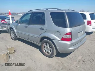 2003 Mercedes-Benz M-Class 3.2L with VIN 4JGAB54E23A383144, listed as a IAAI auction lot 41782124 with 148,084 mi miles. Bid and sale history available at carsss.com. Image 3.