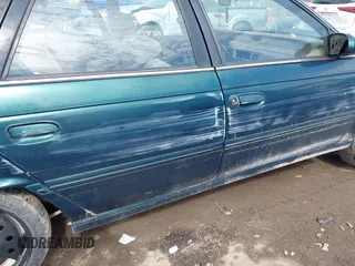 1995 Mercury Sable GS z VIN 1MELM50U8SA632936, wystawiony jako IAAI lot #41695182 z przebiegiem 124 194 mil mil oraz . Historia ofert i sprzedaży dostępna na DreamBid. Obrazek 14.