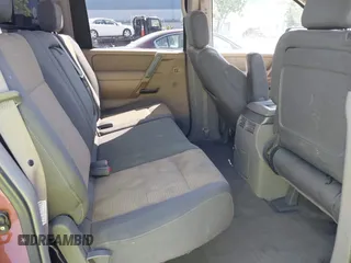 2004 Nissan Titan LE z VIN 1N6AA07A84N514538, wystawiony jako IAAI lot #42396385 z przebiegiem 214 783 mil mil oraz . Historia ofert i sprzedaży dostępna na DreamBid. Obrazek 8.