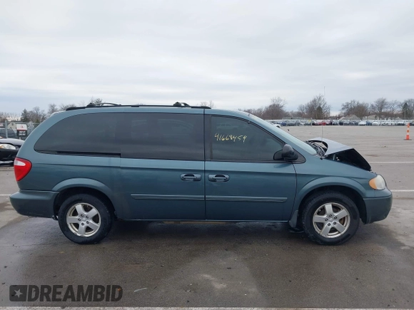 2005 Dodge Caravan SXT with VIN 2D4GP44LX5R115310, listed as a IAAI auction lot 41668454 with 115,784 mi miles and . Bid and sale history available at DreamBid. Image 14.