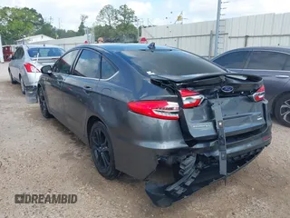 2019 Ford Fusion SE with VIN 3FA6P0HD7KR169700, listed as a IAAI auction lot 42064494 with 56,463 mi miles and . Bid and sale history available at DreamBid. Image 3.