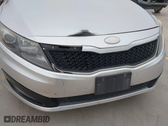 2013 Kia Optima LX with VIN KNAGM4A79D5377485, listed as a IAAI auction lot 41290306 with 172,253 mi miles. Bid and sale history available at carsss.com. Image 20.