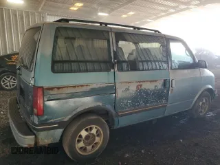 1993 GMC Safari z VIN 1GKDM15W6PB504662, wystawiony jako Copart lot #72306913 z przebiegiem 333 276 mil mil oraz Tytuł czysty. Historia ofert i sprzedaży dostępna na DreamBid. Obrazek 3.