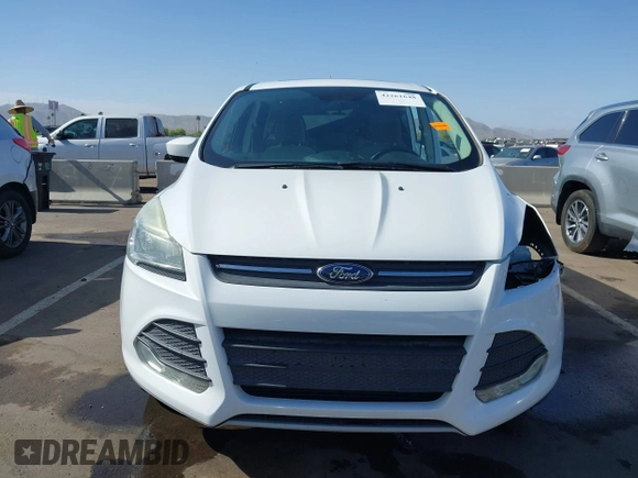 2015 Ford Escape z VIN 1FMTU0G90FUA81004, wystawiony jako IAAI lot #42261648 z przebiegiem 169 989 mil mil oraz . Historia ofert i sprzedaży dostępna na DreamBid. Obrazek 13.