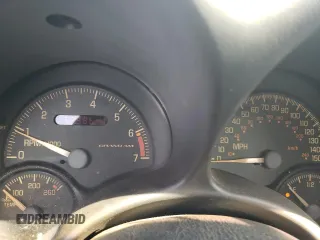 1999 Pontiac Grand Am GT with VIN 1G2NW12E0XM853038, listed as a Copart auction lot 69262194 with 162,986 mi miles and Salvage Title. Bid and sale history available at carsss.com. Image 9.