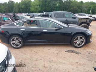 2014 Tesla Model S 60 z VIN 5YJSA1H10EFP34137, wystawiony jako IAAI lot #42311565 z przebiegiem Nie podano mil oraz . Historia ofert i sprzedaży dostępna na DreamBid. Obrazek 12.