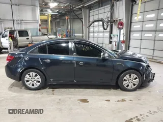 2014 Chevrolet Cruze LS z VIN 1G1PA5SH3E7473796, wystawiony jako IAAI lot #42191642 z przebiegiem 63 873 mil mil oraz . Historia ofert i sprzedaży dostępna na DreamBid. Obrazek 13.