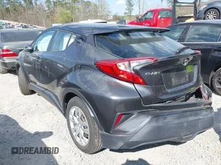 2021 Toyota C-HR LE with VIN NMTKHMBX3MR128835, listed as a IAAI auction lot 41891619 with 57,744 mi miles and . Bid and sale history available at DreamBid. Image 3.