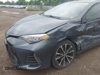 2017 Toyota Corolla L z VIN 5YFBURHE7HP633484, wystawiony jako IAAI lot #42538243 z przebiegiem 80 492 mil mil oraz . Historia ofert i sprzedaży dostępna na DreamBid. Obrazek 6.