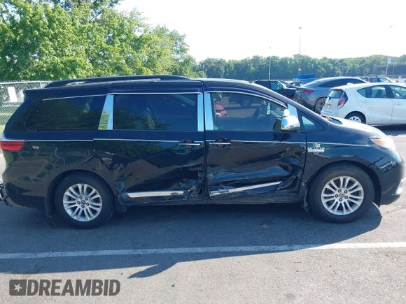 2015 Toyota Sienna XLE with VIN 5TDYK3DC1FS547142, listed as a IAAI auction lot 42675729 with 98,232 mi miles and . Bid and sale history available at DreamBid. Image 13.