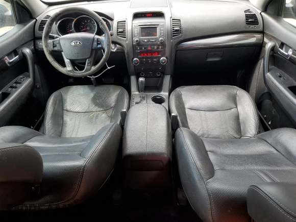 2012 Kia Sorento EX z VIN 5XYKU4A27CG229651, wystawiony jako Copart lot #60314715 z przebiegiem 117 876 mil mil oraz Szkoda całkowita • Salvage title. Historia ofert i sprzedaży dostępna na DreamBid. Obrazek 8.