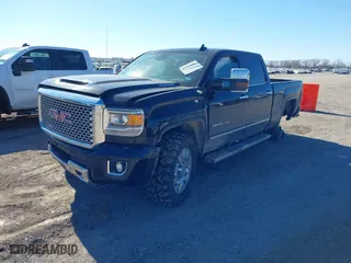 2017 GMC Sierra 2500HD Denali with VIN 1GT12UEY5HF118445, listed as a IAAI auction lot 41327986 with 158,970 mi miles. Bid and sale history available at carsss.com. Image 17.