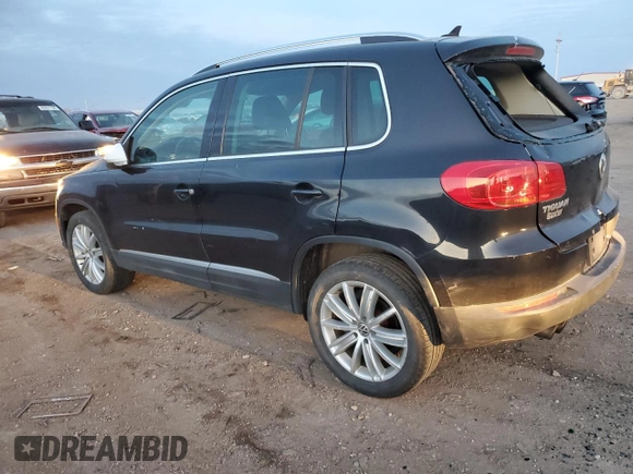 2012 Volkswagen Tiguan S with VIN WVGBV7AX9CW583728, listed as a Copart auction lot 82422184 with 151,557 mi miles and Salvage Title. Bid and sale history available at DreamBid. Image 2.