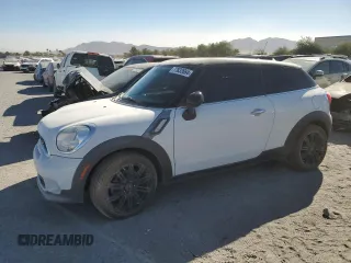 2015 MINI Paceman S with VIN WMWSS5C59FWN67351, listed as a Copart auction lot 77832664 with 91,361 mi miles and Salvage Title. Bid and sale history available at DreamBid. Image 1.