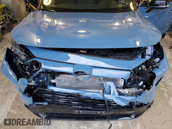 2024 Toyota RAV4 Hybrid XSE with VIN 2T3E6RFV5RW072655, listed as a Copart auction lot 81327074 with 3,558 mi miles and Salvage Title. Bid and sale history available at carsss.com. Image 12.