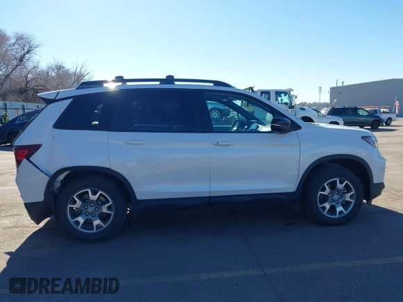 2023 Honda Passport TrailSport with VIN 5FNYF8H60PB015912, listed as a IAAI auction lot 41667749 with 35,019 mi miles and . Bid and sale history available at carsss.com. Image 14.