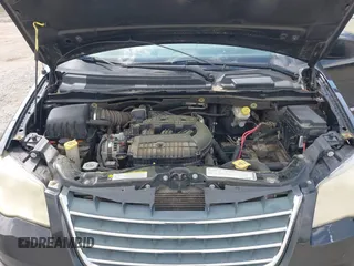 2010 Chrysler Town & Country Touring with VIN 2A4RR5DX5AR329523, listed as a IAAI auction lot 41941874 with 207,079 mi miles. Bid and sale history available at carsss.com. Image 10.