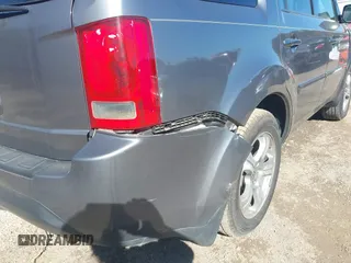 2013 Honda Pilot EX-L with VIN 5FNYF3H79DB037477, listed as a IAAI auction lot 41649734 with 161,902 mi miles and . Bid and sale history available at DreamBid. Image 17.