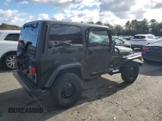 2002 Jeep Wrangler SE with VIN 1J4FA29P82P732805, listed as a Copart auction lot 86017044 with 138,679 mi miles and Salvage Title. Bid and sale history available at DreamBid. Image 3.