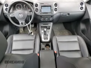 2016 Volkswagen Tiguan SE z VIN WVGBV7AX7GW516082, wystawiony jako Copart lot #59110585 z przebiegiem 65 912 mil mil oraz Czysty tytuł • Clean title. Historia ofert i sprzedaży dostępna na DreamBid. Obrazek 8.