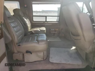 1995 Chevrolet Chevy Van z VIN 1GBEG25K9SF175004, wystawiony jako Copart lot #77952694 z przebiegiem 217 649 mil mil oraz Szkoda całkowita • Salvage title. Historia ofert i sprzedaży dostępna na DreamBid. Obrazek 11.