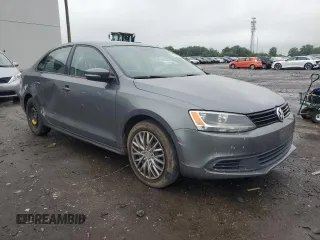2012 Volkswagen Jetta SE with VIN 3VWDX7AJ0CM408784, listed as a Copart auction lot 56673235 with 203,203 mi miles and Salvage title. Bid and sale history available at DreamBid. Image 4.