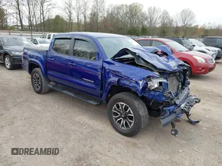 2023 Toyota Tacoma SR z VIN 3TMCZ5AN1PM589061, wystawiony jako IAAI lot #41936717 z przebiegiem 41 395 mil mil oraz . Historia ofert i sprzedaży dostępna na DreamBid. Obrazek 1.