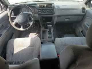 2000 Nissan Frontier XE with VIN 1N6ED27T3YC348002, listed as a Copart auction lot 54538235 with 289,922 mi miles and Salvage title. Bid and sale history available at DreamBid. Image 8.