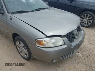 2006 Nissan Sentra S z VIN 3N1CB51D66L496829, wystawiony jako IAAI lot #42107673 z przebiegiem 118 671 mil mil oraz . Historia ofert i sprzedaży dostępna na DreamBid. Obrazek 12.