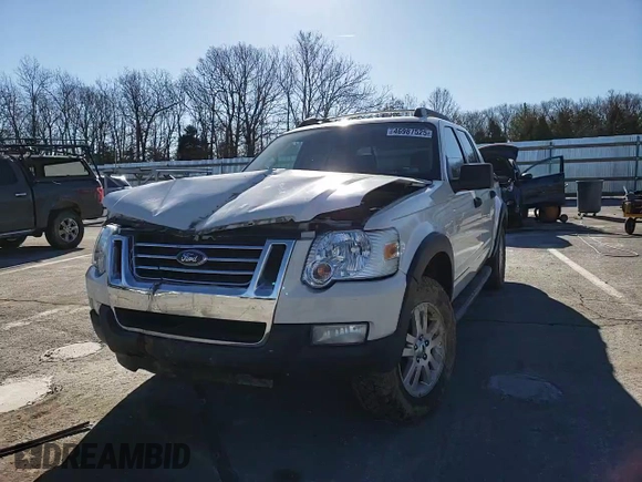2010 Ford Explorer Sport Trac XLT z VIN 1FMEU3BE5AUA38530, wystawiony jako Copart lot #46987525 z przebiegiem 132 432 mil mil oraz Szkody całkowita. Historia ofert i sprzedaży dostępna na DreamBid. Obrazek 11.