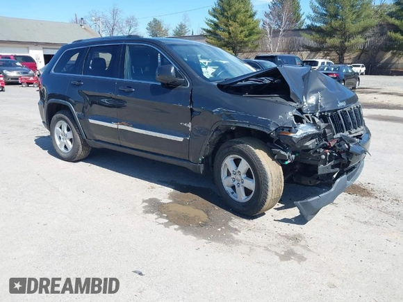 2011 Jeep Grand Cherokee Laredo z VIN 1J4RR4GG9BC519132, wystawiony jako IAAI lot #41931266 z przebiegiem 118 534 mil mil oraz . Historia ofert i sprzedaży dostępna na DreamBid. Obrazek 1.